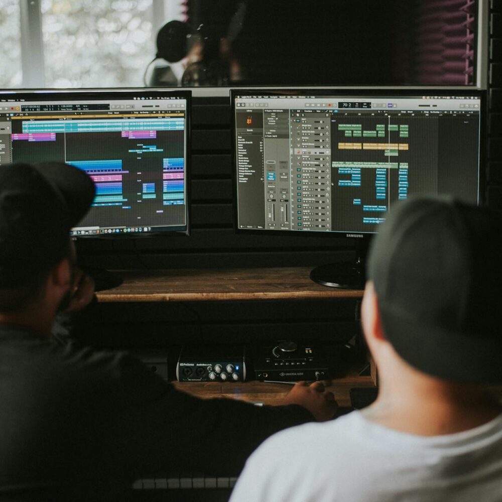 back view of working in music studio